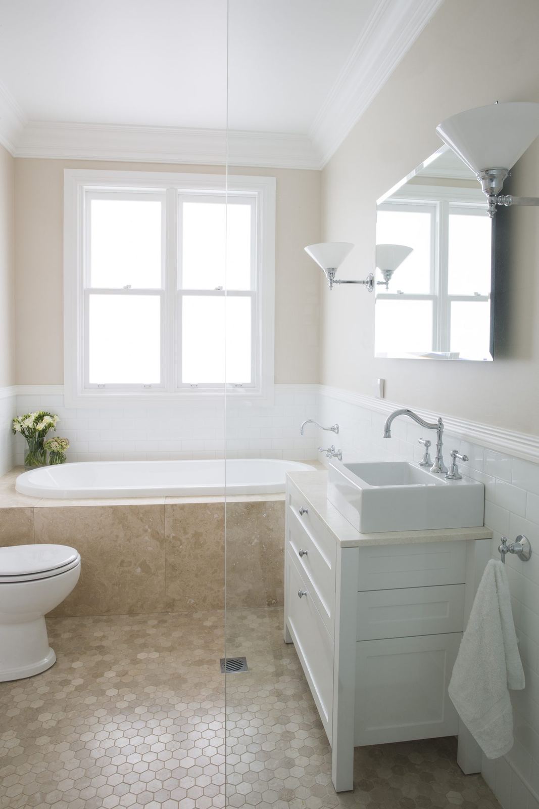 Balgowlah Heights — bathroom with bath, white vanity, window and mosaic-tiled floor, built by HP Constructions with All Australian Architecture