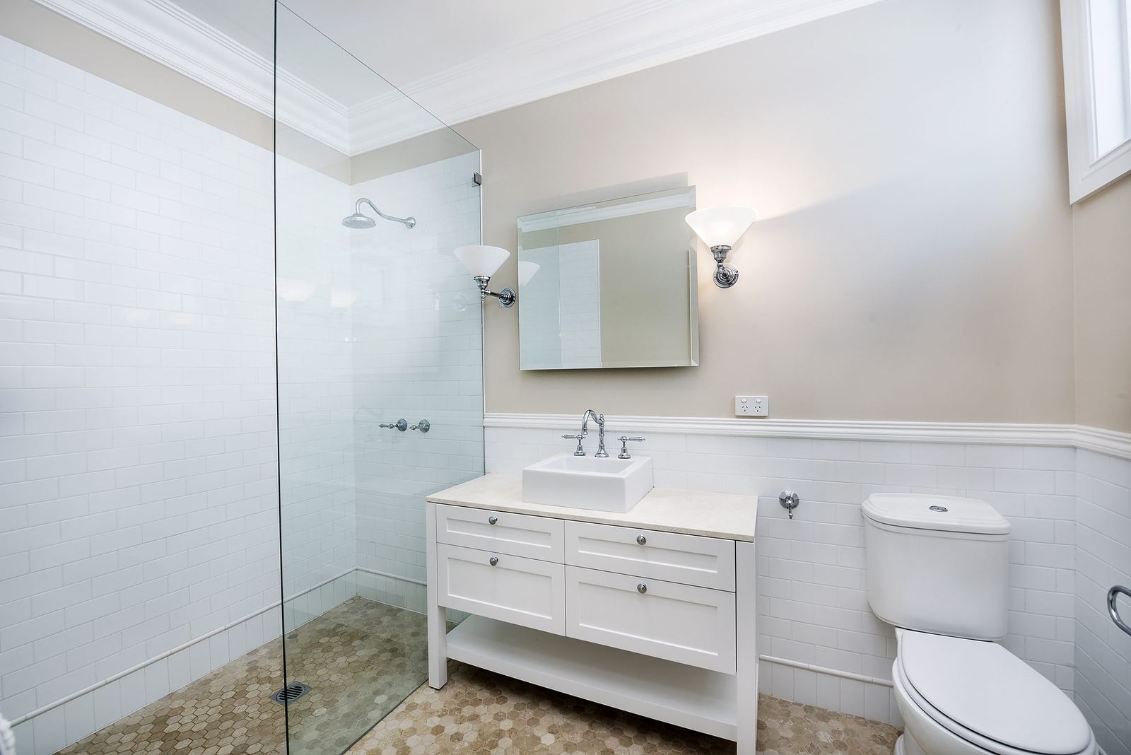 Balgowlah Heights — bathroom with glass shower, white vanity, mirror and subway-tiled walls, built by HP Constructions with All Australian Architecture