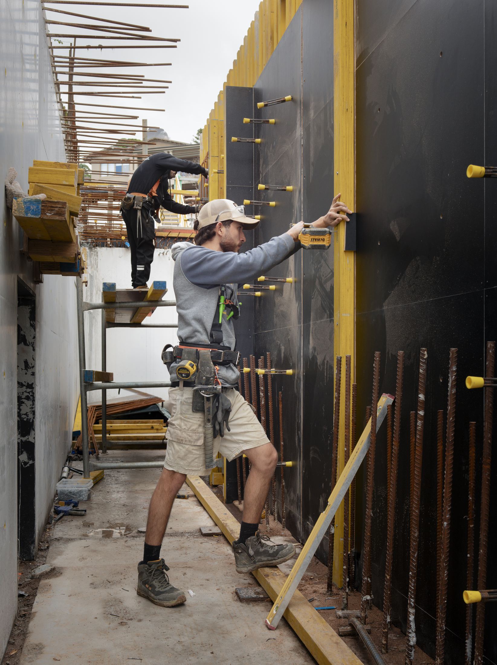 Vaucluse under construction, HP carpenter setting formwork for a concrete wall, HP Constructions