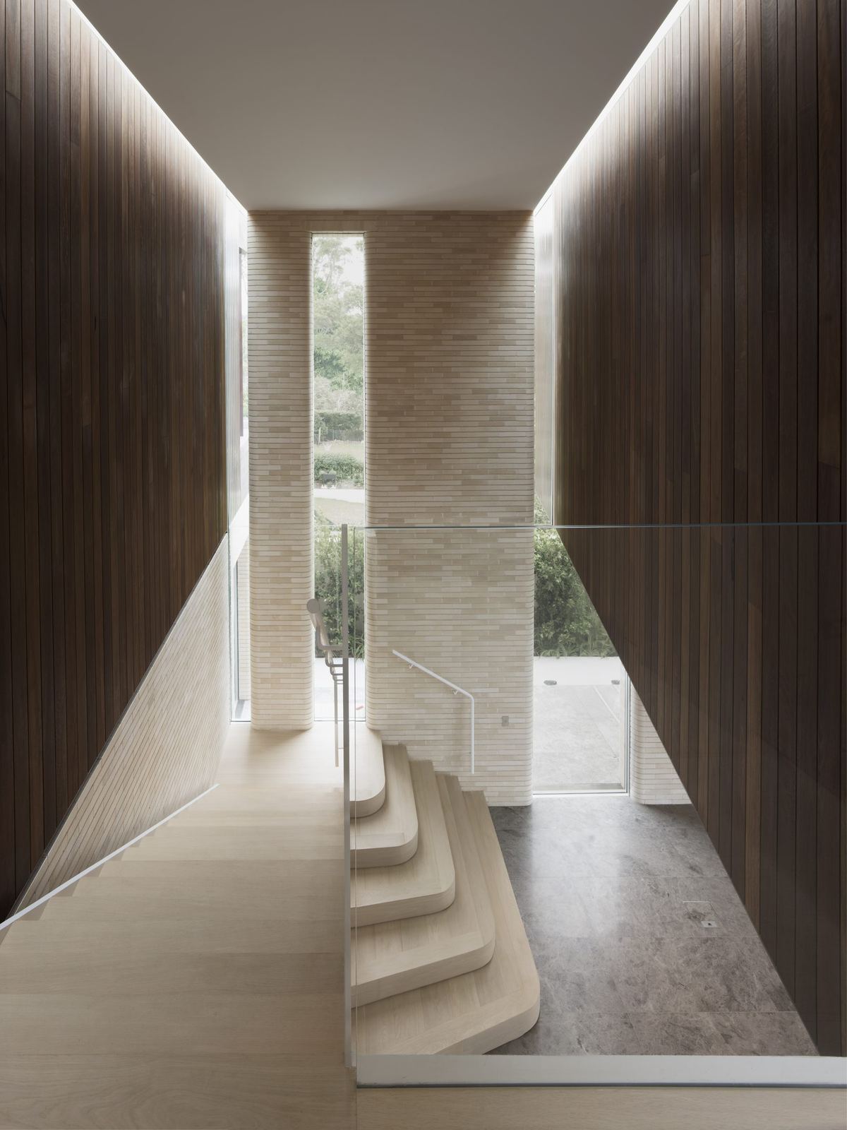 Castlecrag — stone staircase framed by timber walls and column, built by HP Constructions with FJC Studio