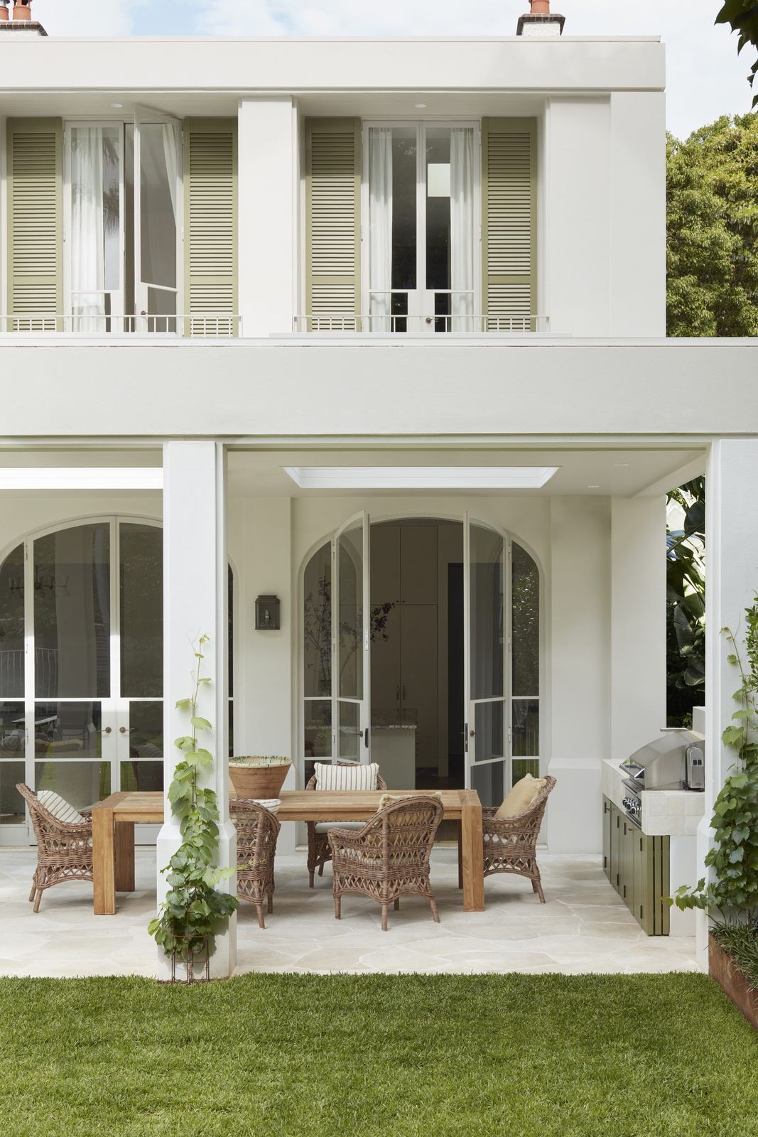 Darling Point — rear facade of white Federation home with shuttered upper balcony, built by HP Constructions with Hancock Architects