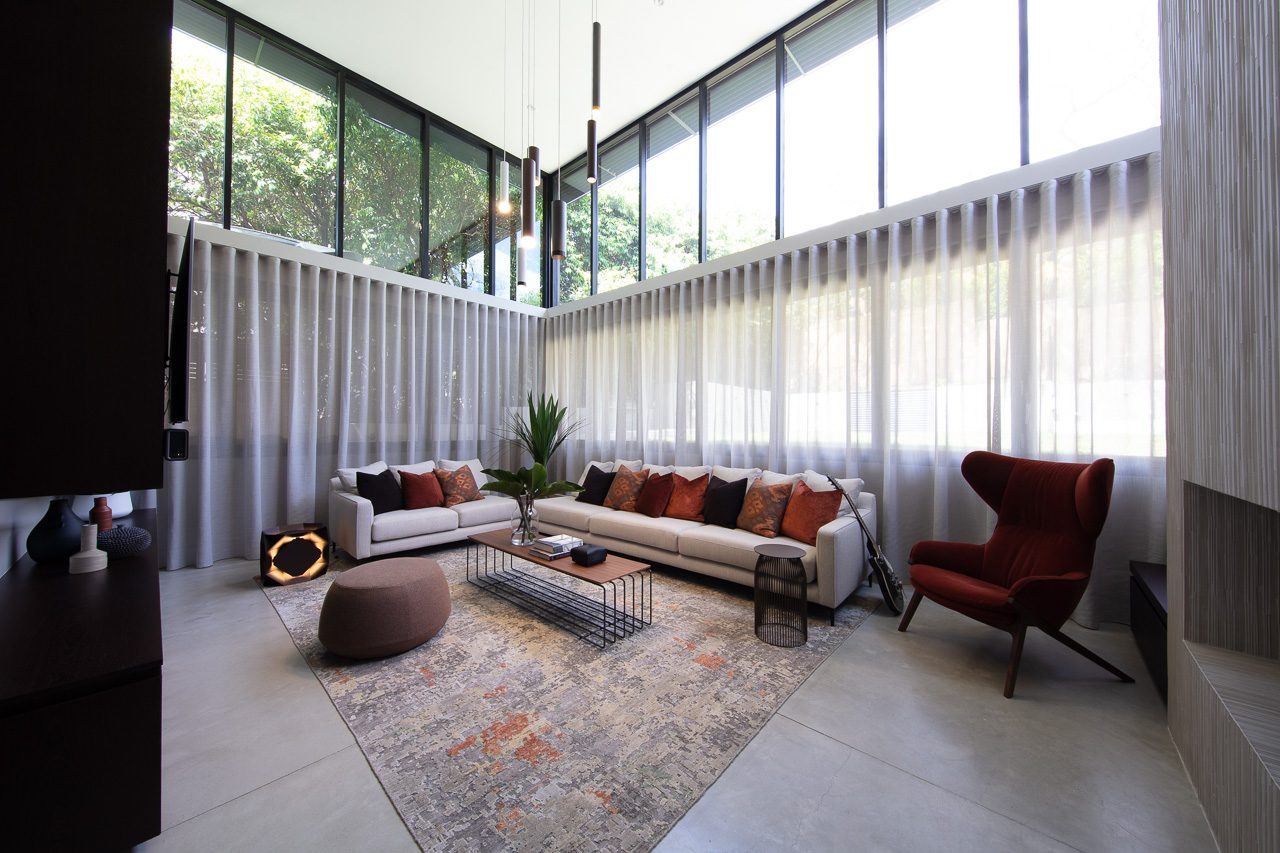 Hunters Hill — living room with floor-to-ceiling windows, sheer curtains and patterned rug, built by HP Constructions with Dale Design Group
