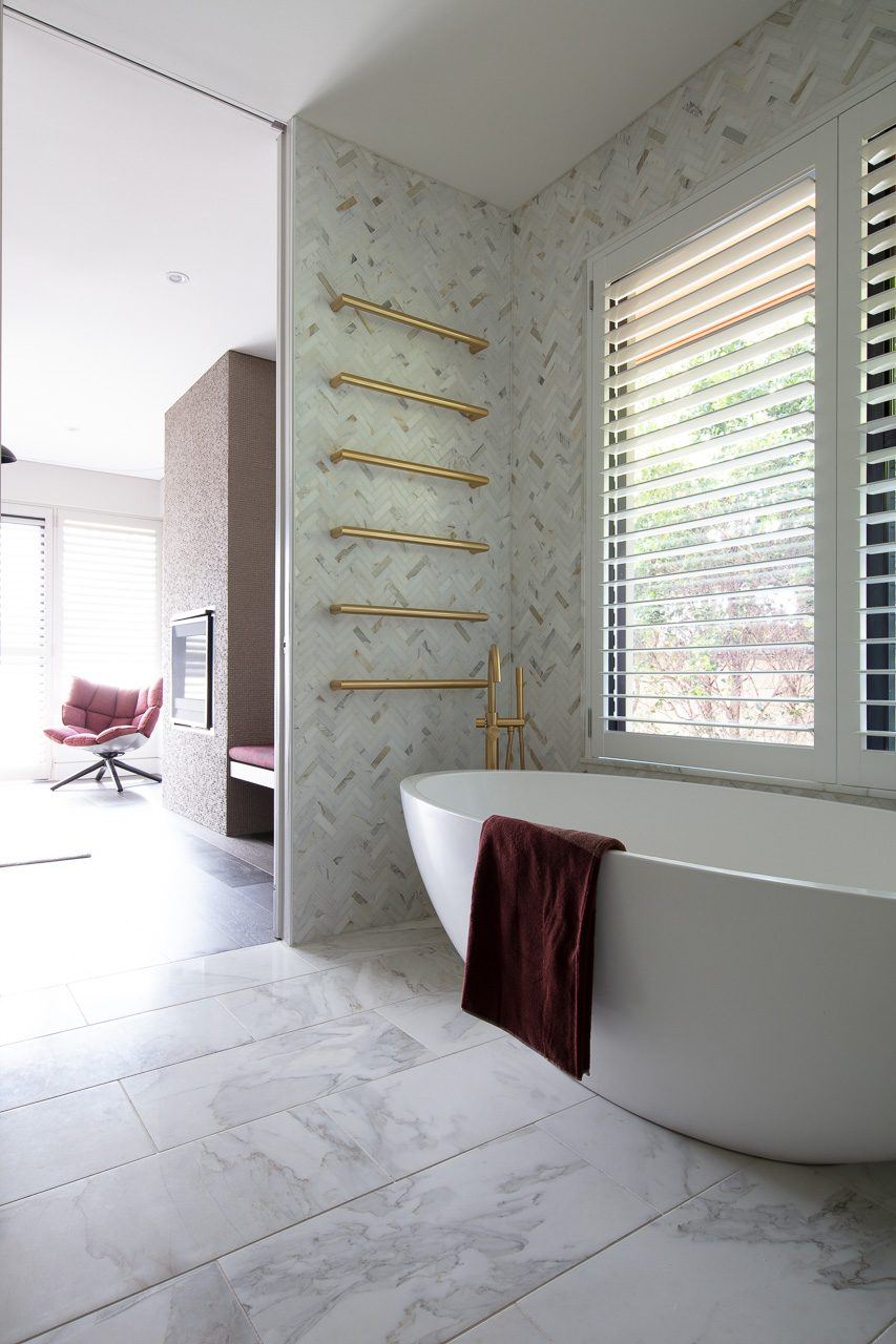 Hunters Hill — bathroom with freestanding bathtub, heated towel rail and shuttered window, built by HP Constructions with Dale Design Group