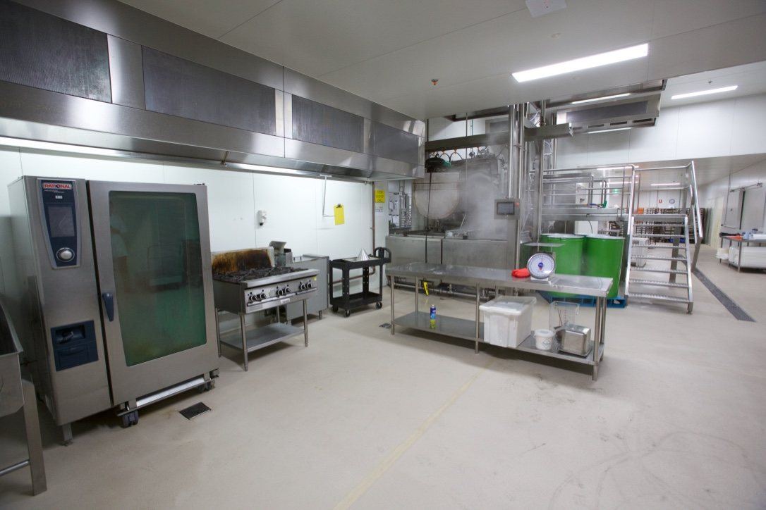 Kitchen Food Company — commercial kitchen with large stainless combi oven and benches, built by HP Constructions