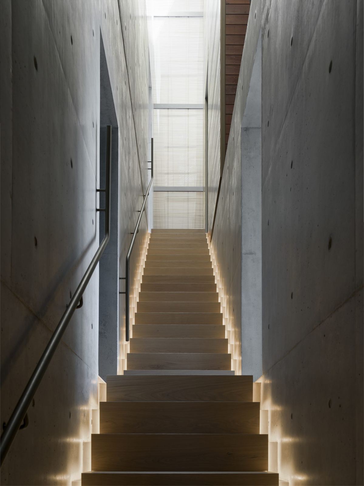 Lurline Bay — floating concrete stair with illuminated treads, built by HP Constructions with FJC Studio