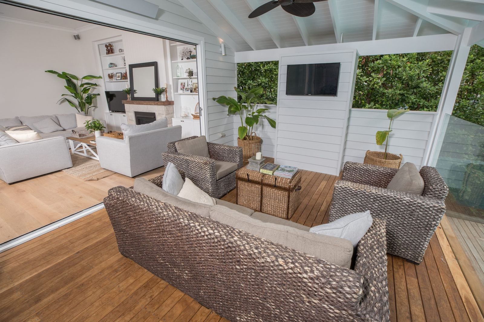 North Balgowlah — covered deck living area with wicker lounges and ceiling fan, built by HP Constructions with J.D Evans & Co
