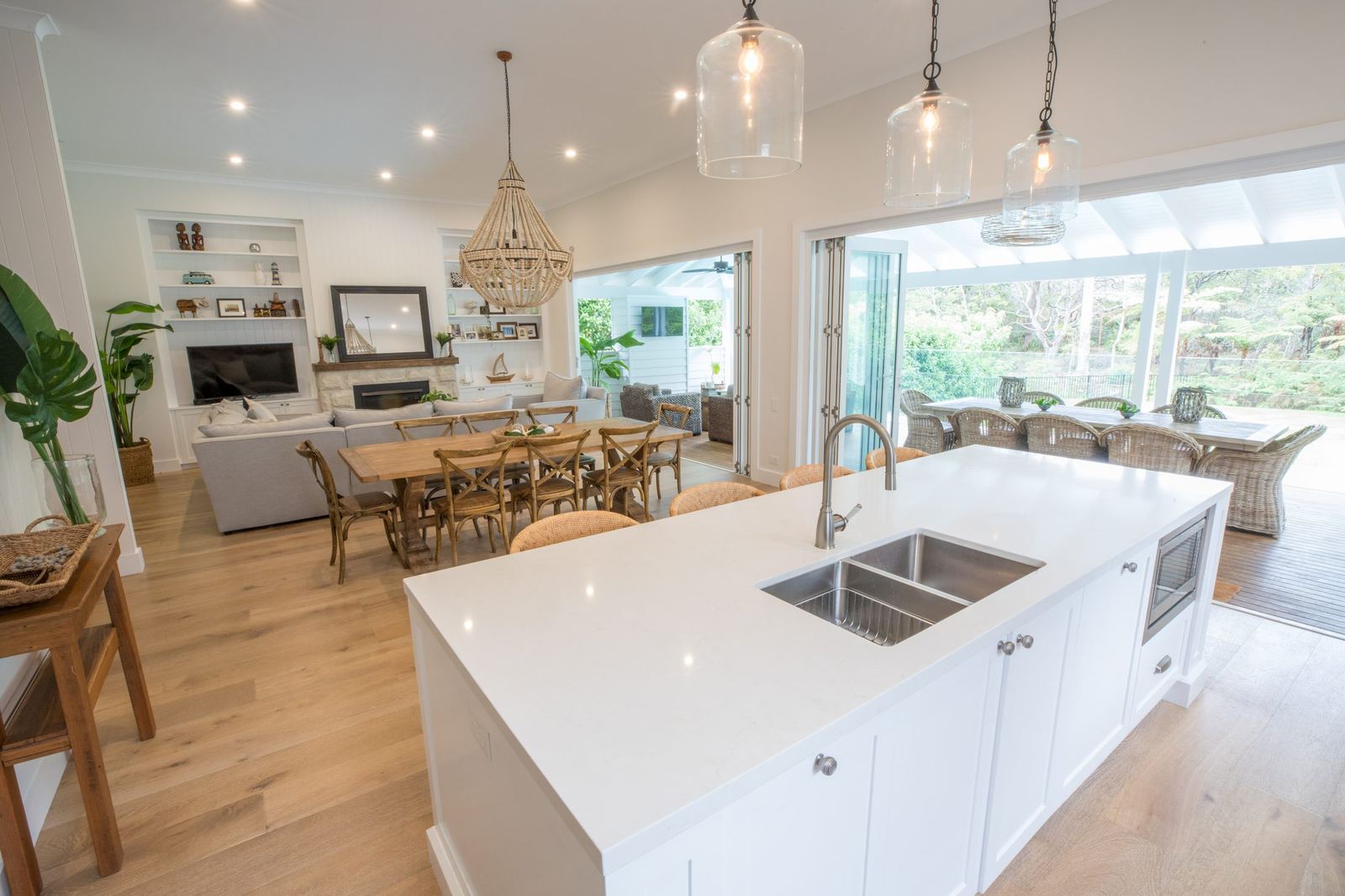 North Balgowlah — open-plan kitchen and living with white island and pendant lights, built by HP Constructions with J.D Evans & Co