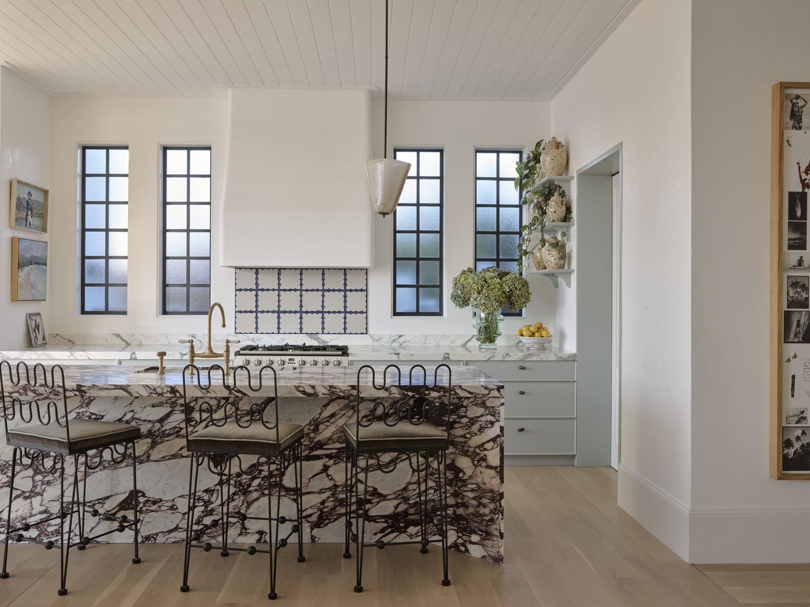 Vaucluse — kitchen with marble island, range hood and arched steel windows, built by HP Constructions with Alexander & Co