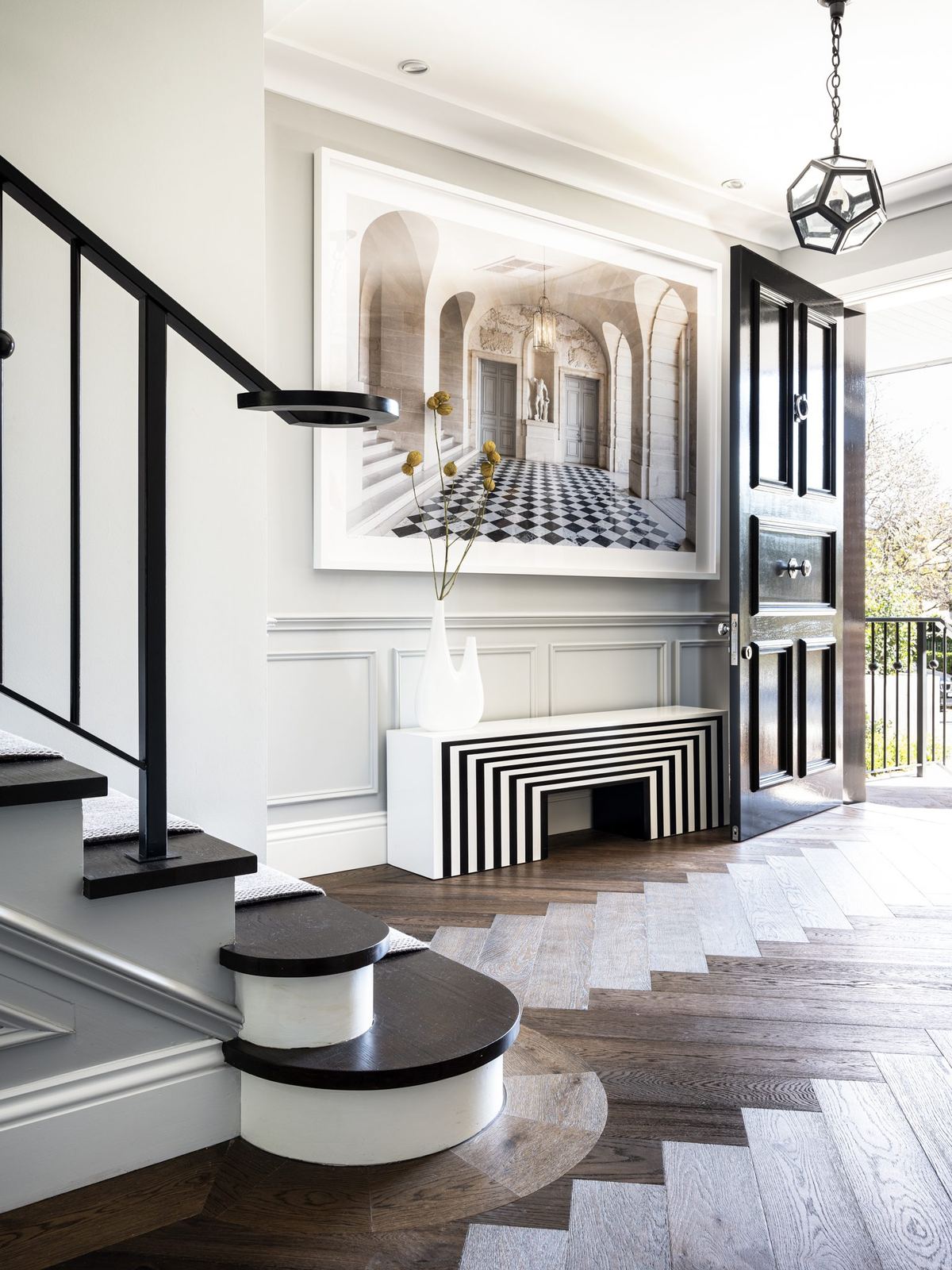 Willoughby — entry hall with staircase, herringbone floor and striped rug, built by HP Constructions with Alexander & Co
