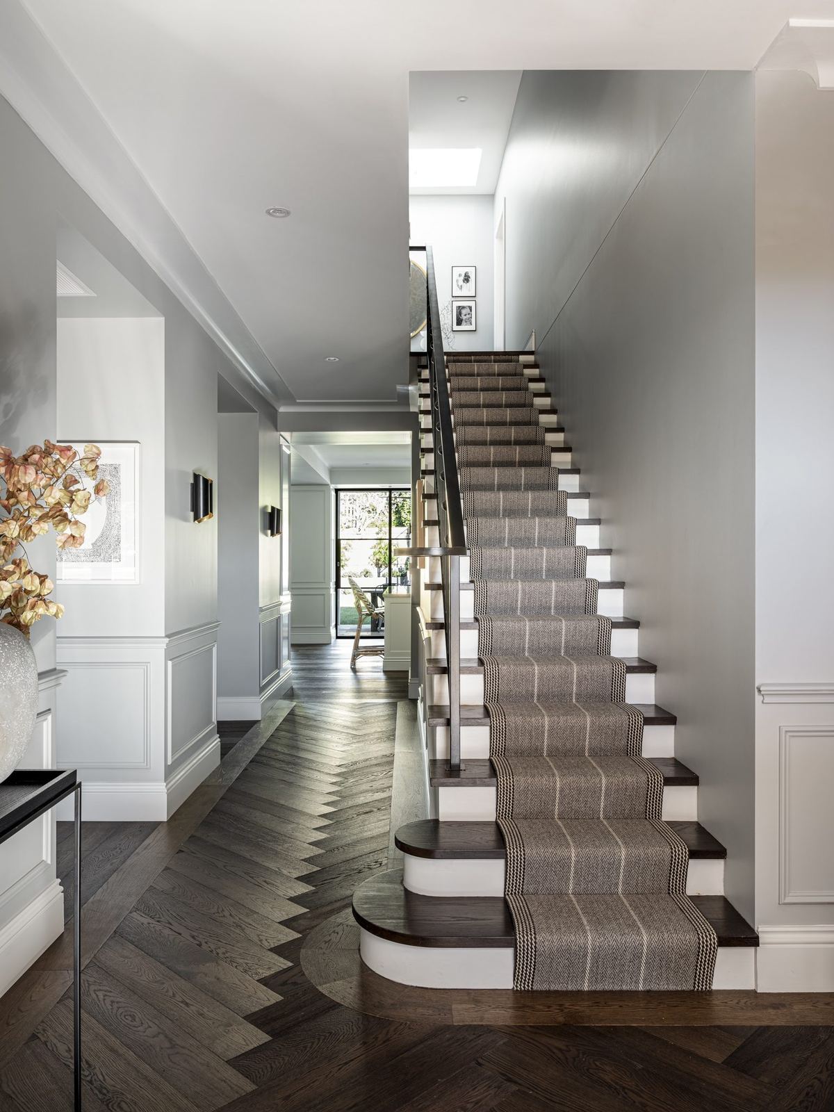 Willoughby — hallway with staircase, patterned runner and herringbone timber floor, built by HP Constructions with Alexander & Co
